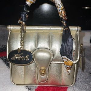 Pale gold quilted Willis. Charm not included